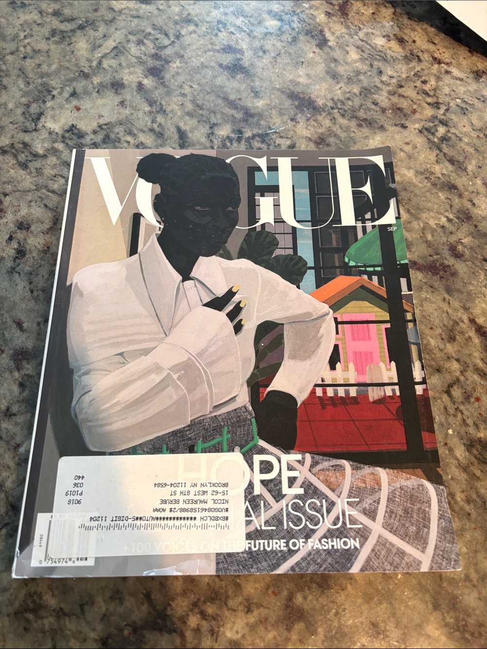 Vogue Cover Featuring White Blouse and Colorful Architectural Accents